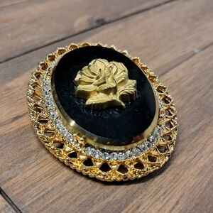 Vintage Celebrity NY Gold and Black Floral Brooch